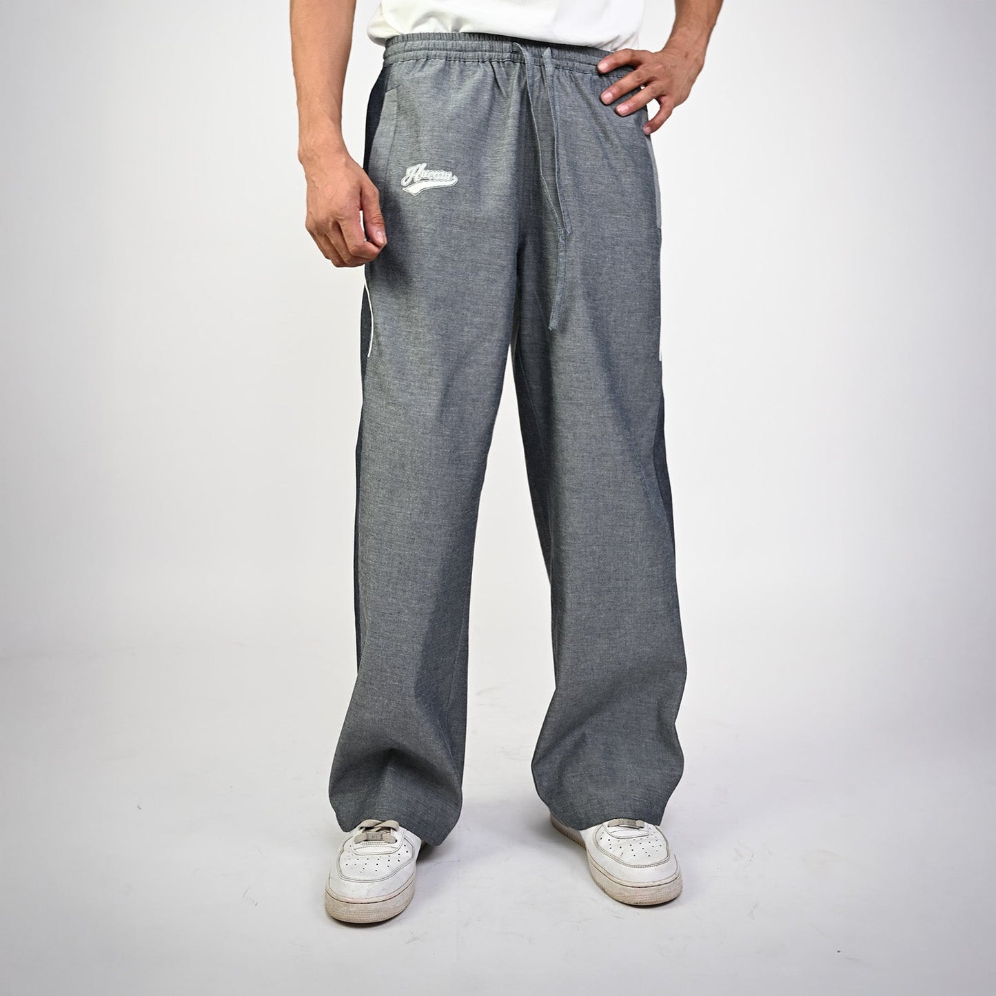 Embroidered denim trackpant with panelled detail (Indigo)