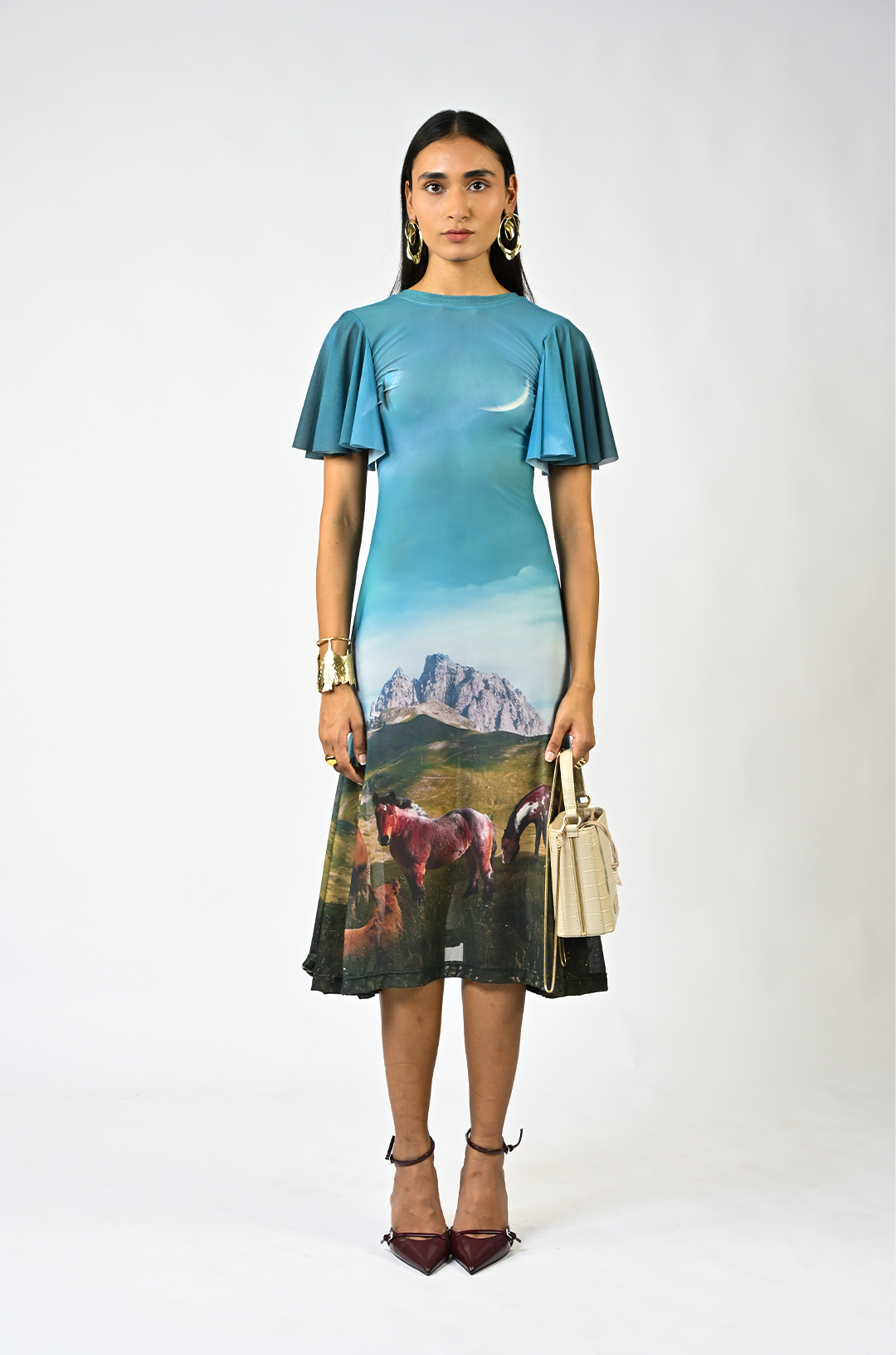 Sculpted horse grazing landscaped lycra dress