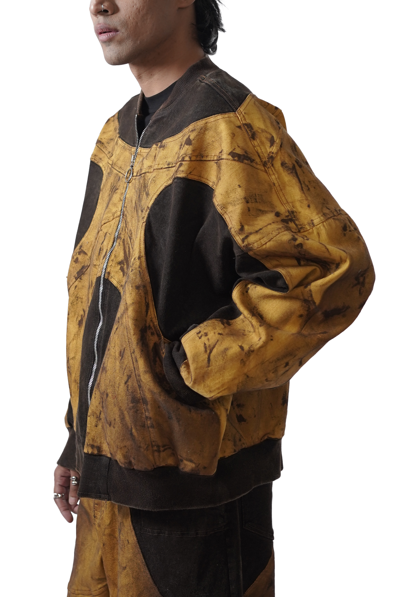 Oversized unisex panelled denim jacket with hand-painted mud washed surface (Copper)