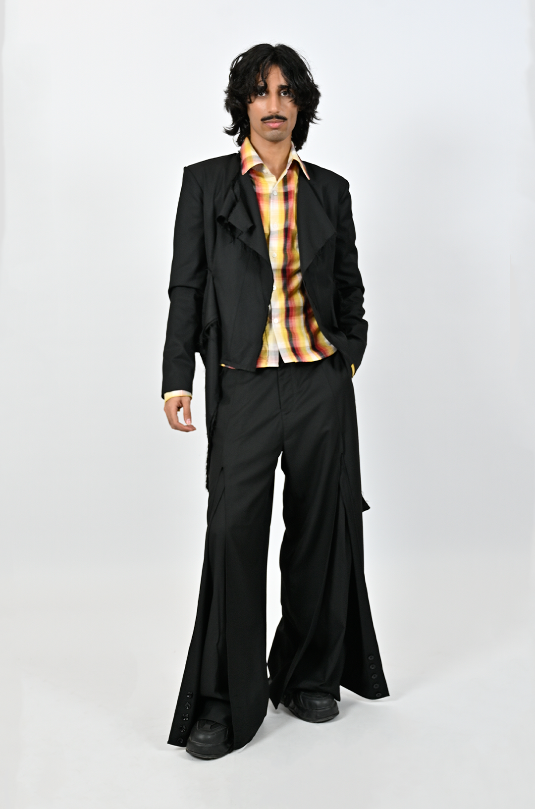 Relaxed fit trousers with center slit detail (Black)