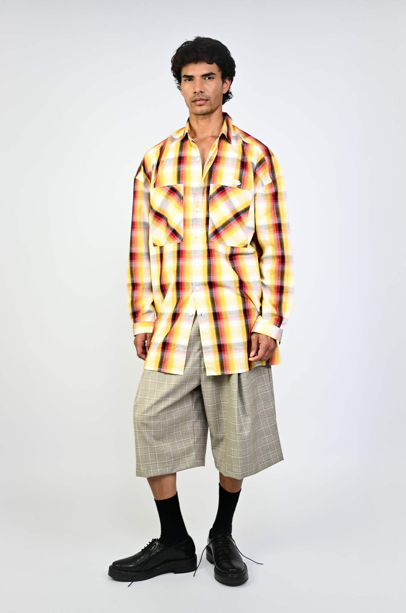 Pleated cullotes in checkered pattern (Beige)