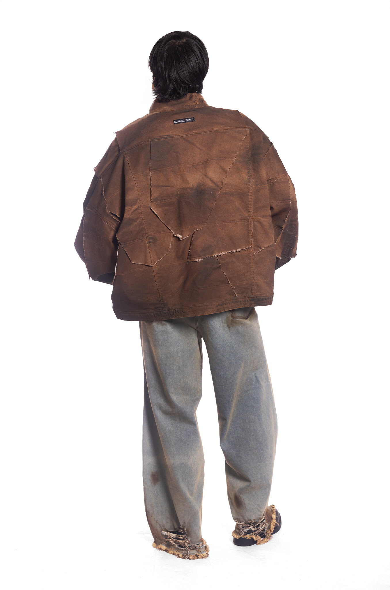 Oversized unisex jacket with 100 patched panels and hand-painted mud washed surface (Brown)