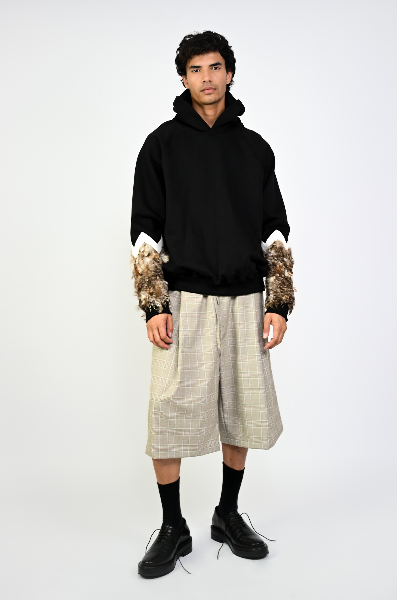 Oversized Black hoodie with feather inset