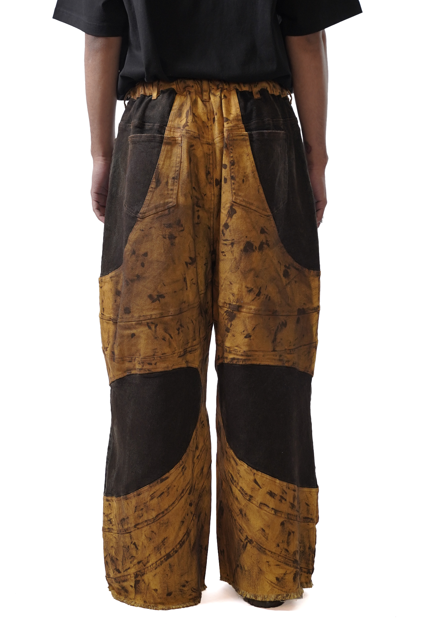 Oversized unisex panelled denim with hand-painted mud washed surface (Copper)