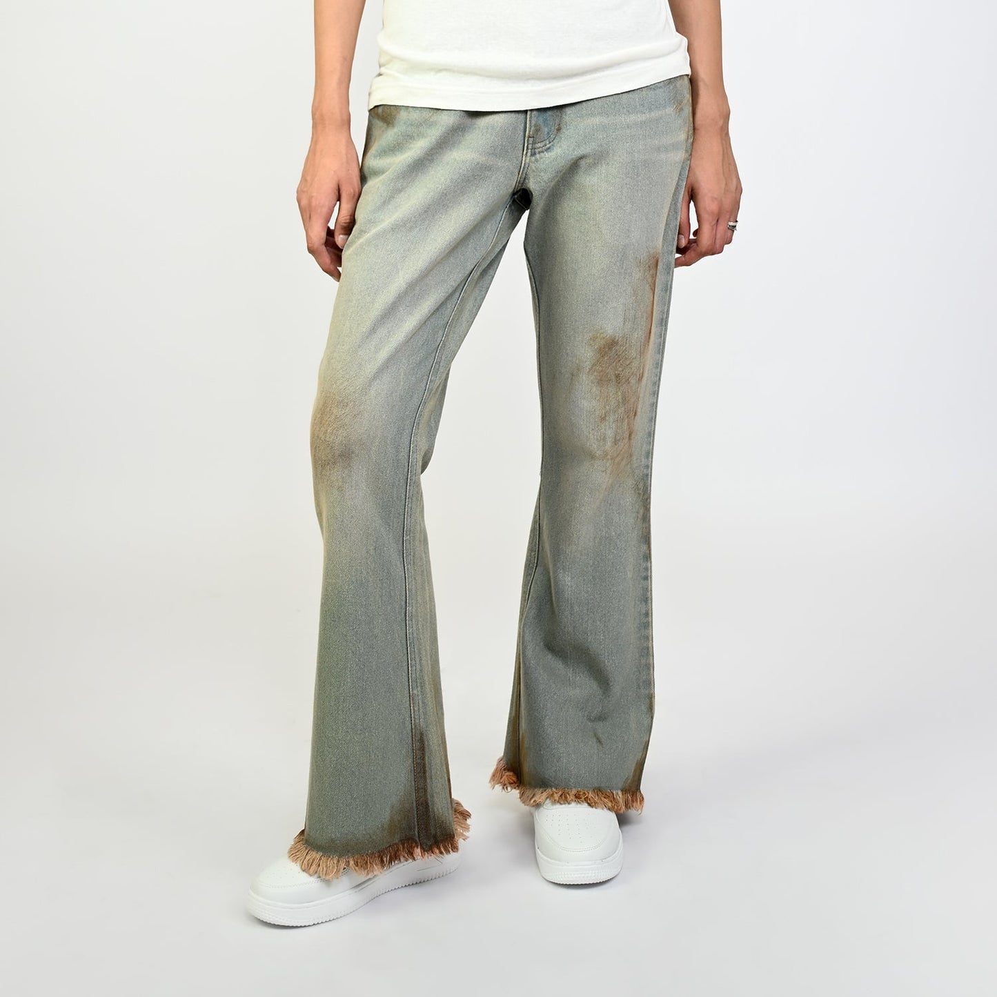 Bootcut denim with hand-painted light mud-washed surface (Indigo)