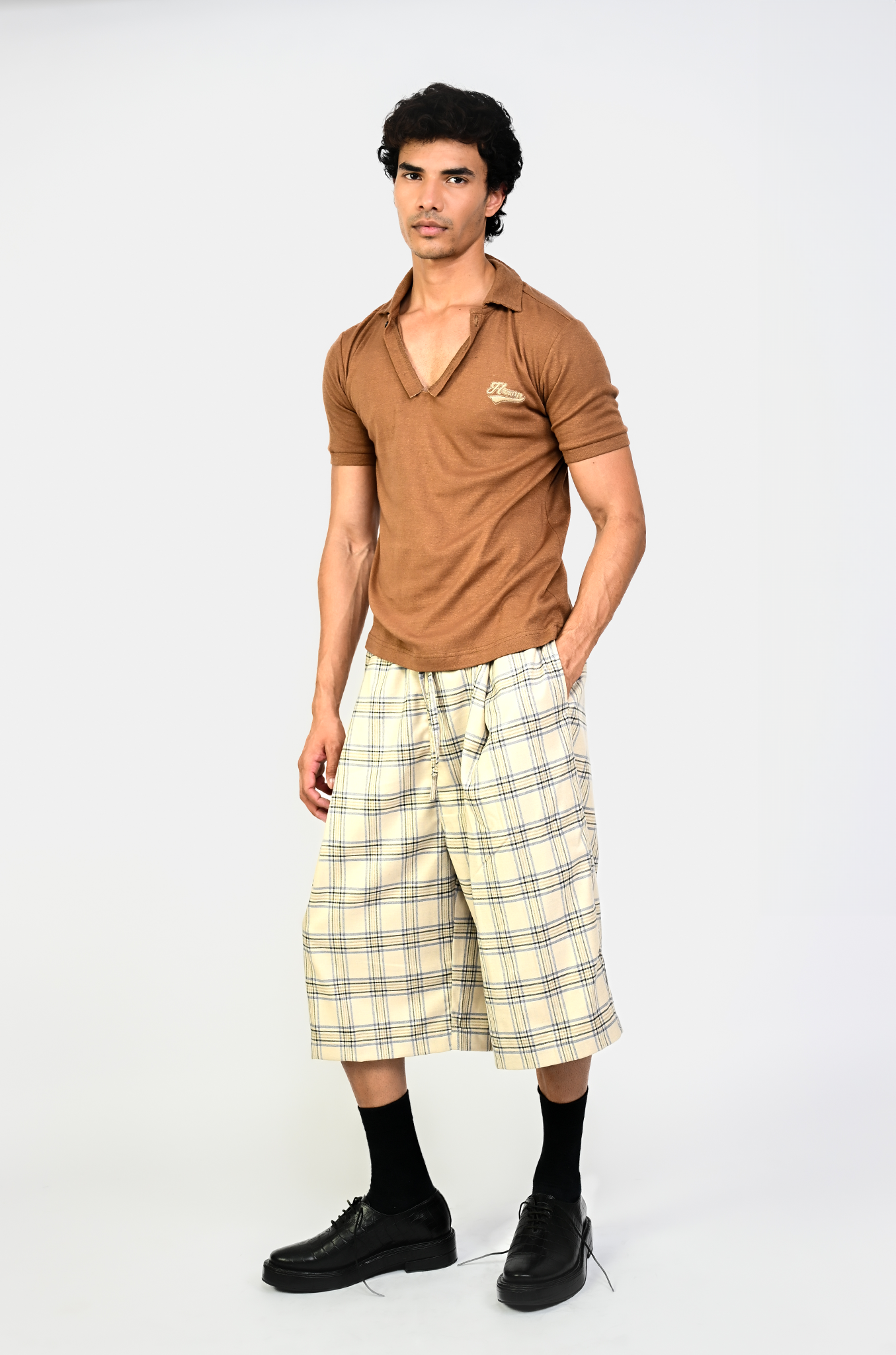 Pleated cullotes in checkered pattern (Cream)