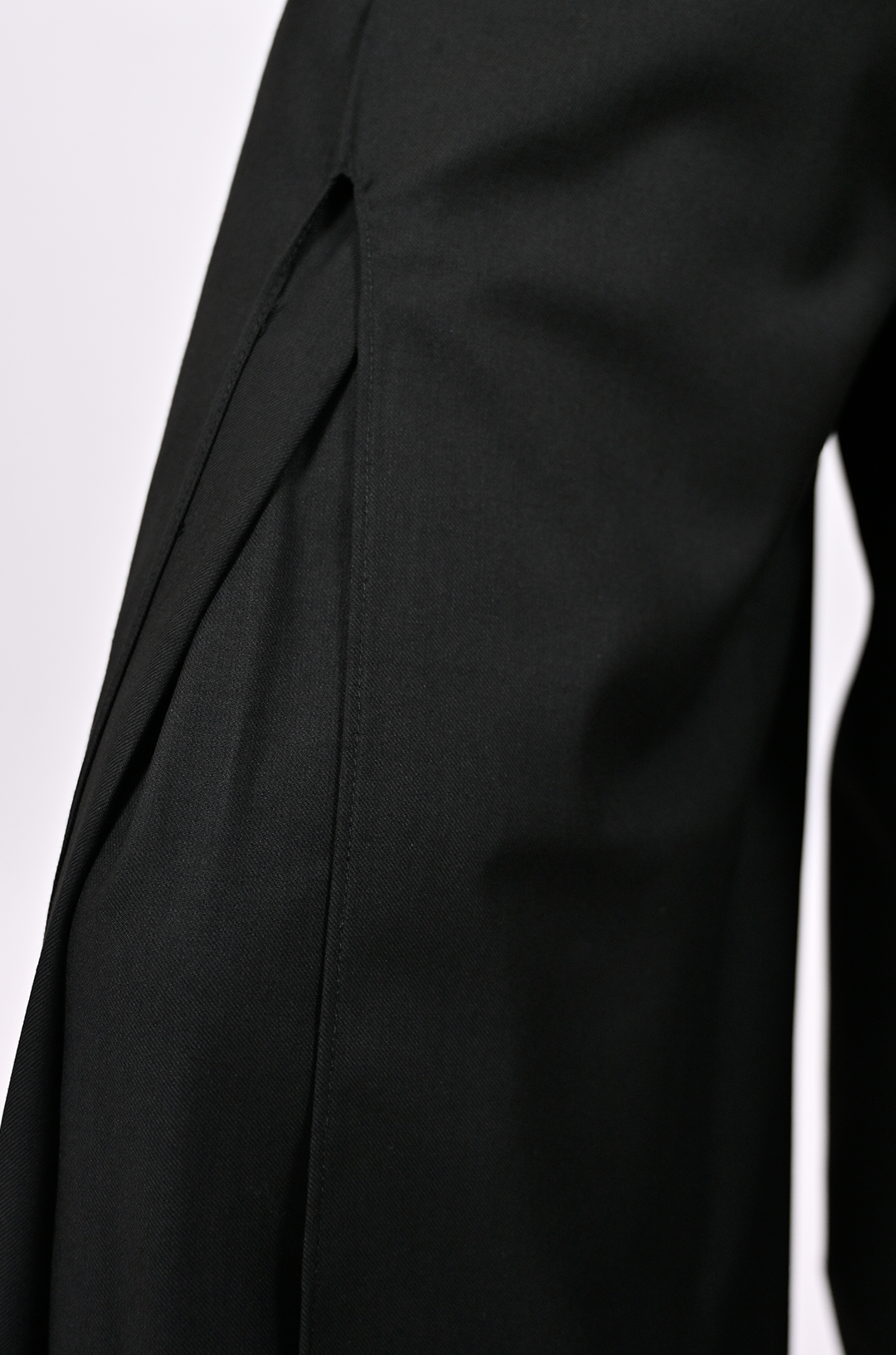 Relaxed fit trousers with center slit detail (Black)