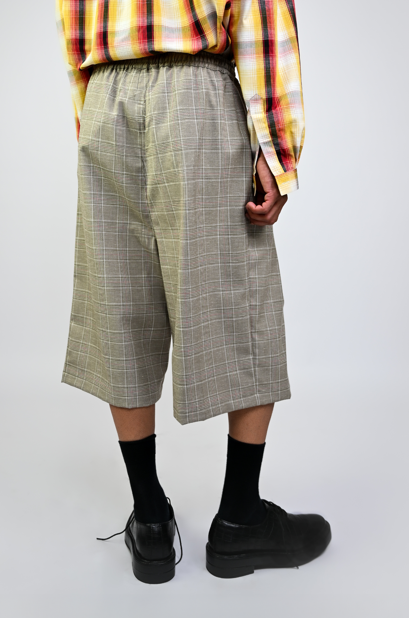 Pleated cullotes in checkered pattern (Beige)