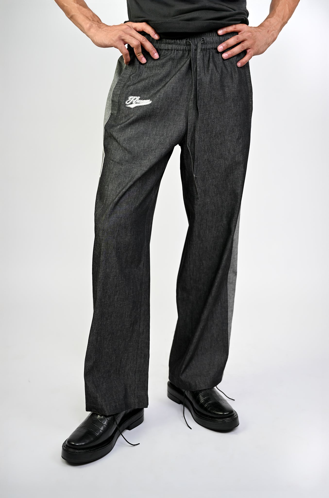 Embroidered denim trackpant with panelled detail (Black)