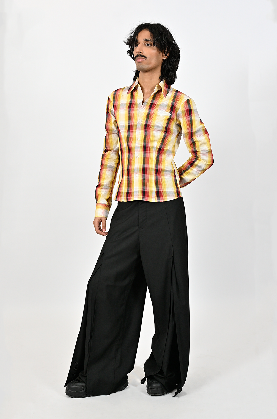 Relaxed fit trousers with center slit detail (Black)