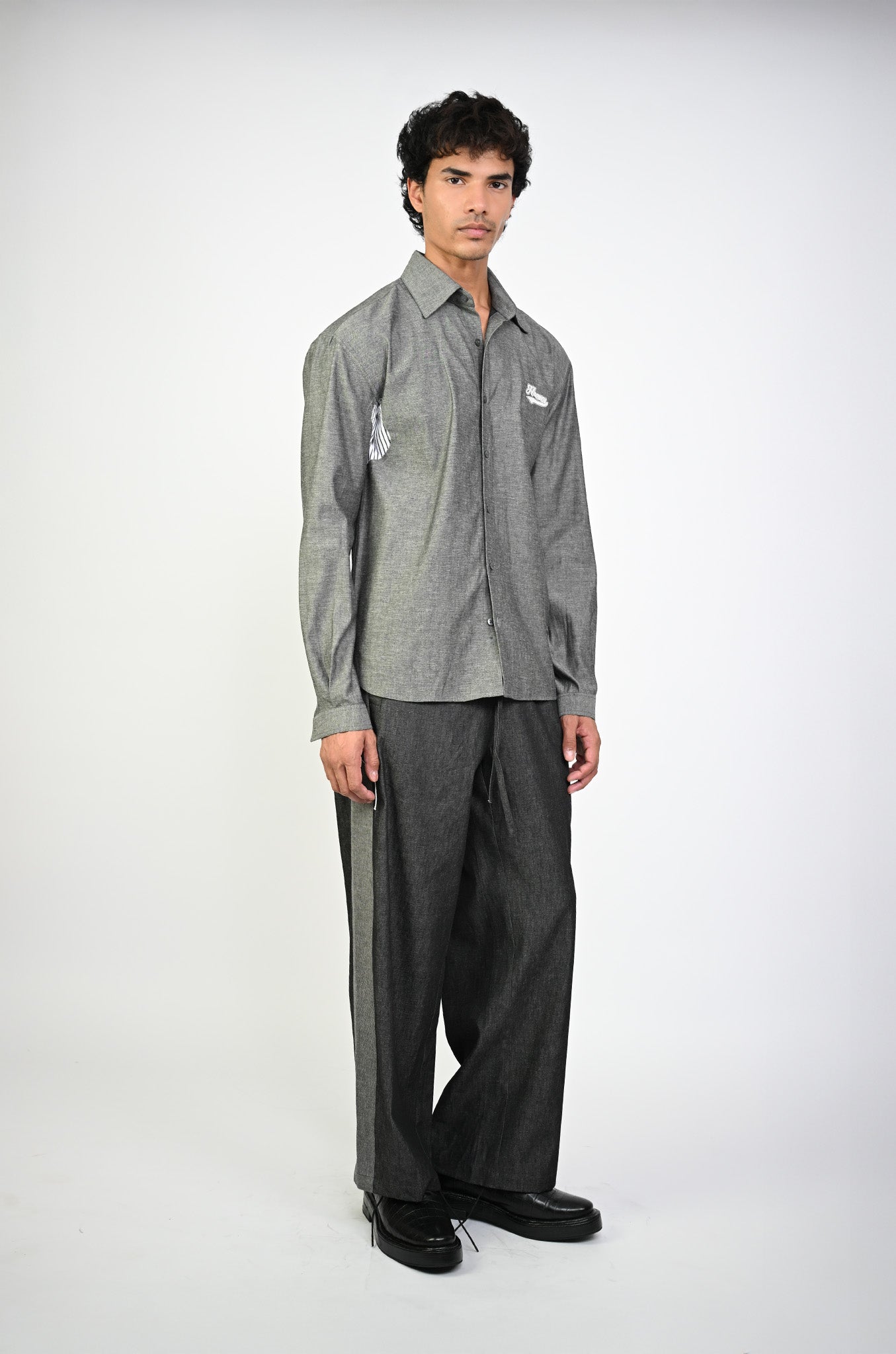 Embroidered denim trackpant with panelled detail (Black)