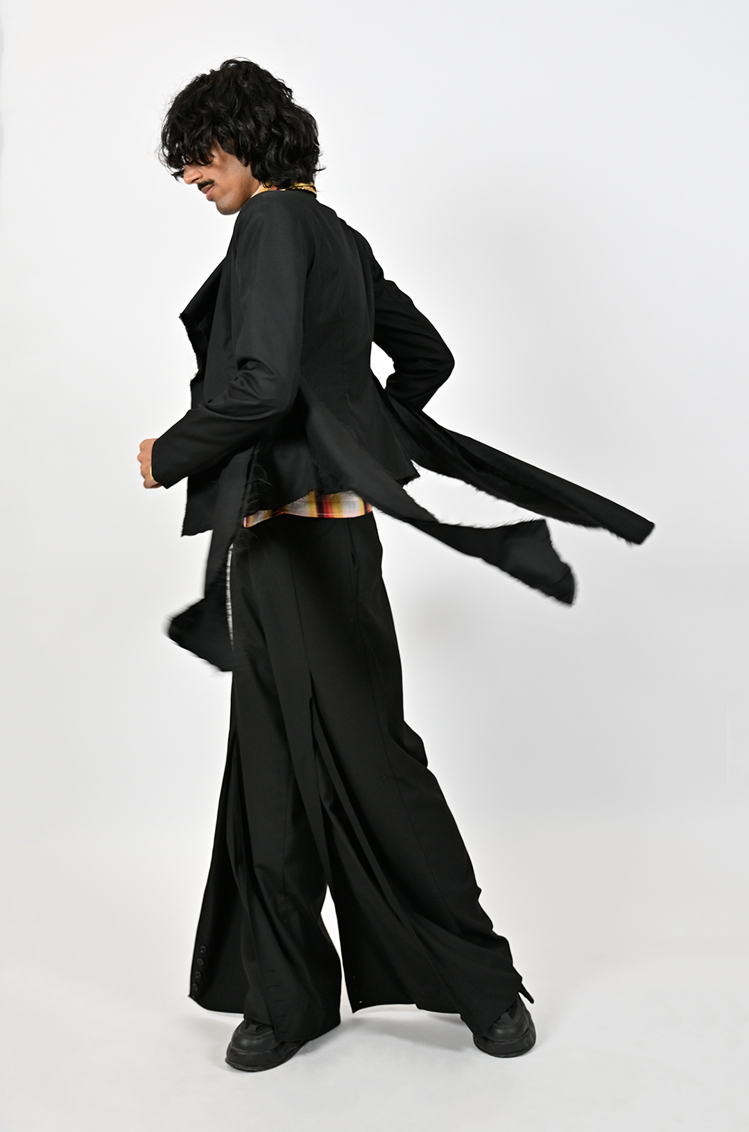 Relaxed fit trousers with center slit detail (Black)