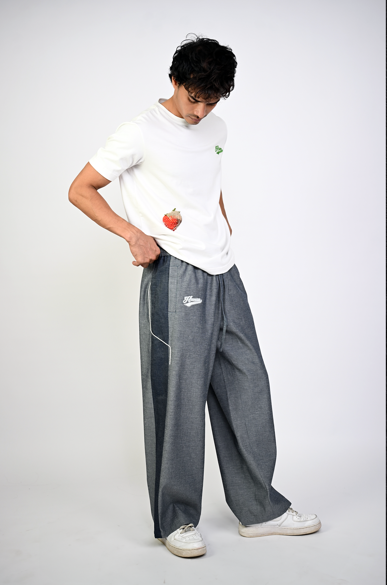 Embroidered denim trackpant with panelled detail (Indigo)
